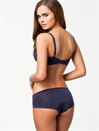 Xenia Deli in lingerie - ass