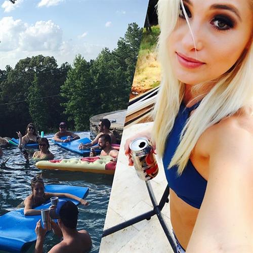 Tomi Lahren in a bikini taking a selfie