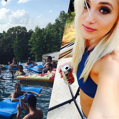 Tomi Lahren taking a selfie