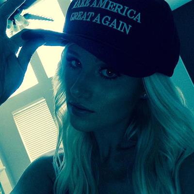 Tomi Lahren taking a selfie