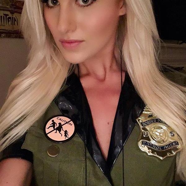 Tomi Lahren taking a selfie