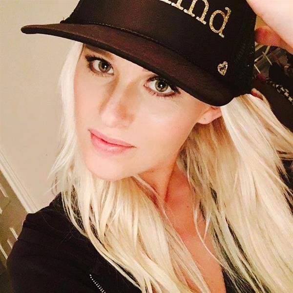 Tomi Lahren taking a selfie