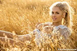 Playboy Cybergirl Kayla Rae Reid Nude in a field