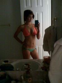 Anonymous in a bikini taking a selfie
