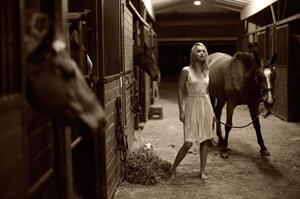 Arielle Kebbel pays tribute to her 1200 pound baby Pacific Breeze during a portrait session Los Angeles 