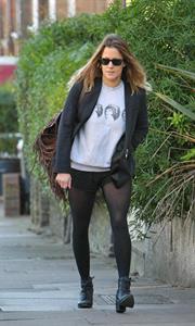 Caroline Flack leaving her London home on December 9, 2011
