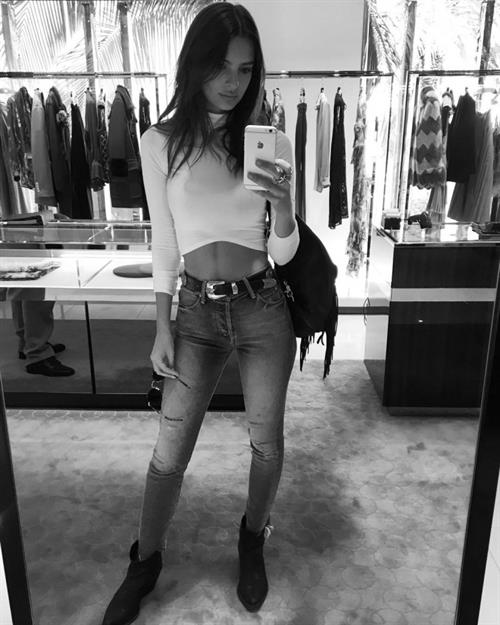 Emily Ratajkowski taking a selfie