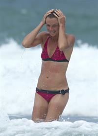Daniela Hantuchova bikini beach surfing candids in Brisbane, Australia, December 26, 2012 