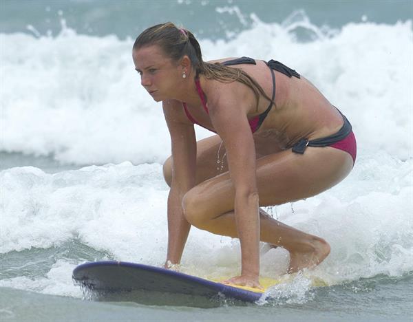 Daniela Hantuchova bikini beach surfing candids in Brisbane, Australia, December 26, 2012 