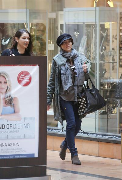 Dannii Minogue - Pictured getting a little wet while filling up on petrol - 09th August 2012