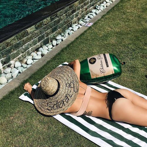 Solenn Heussaff in a bikini - ass