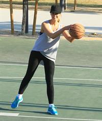 Delta Goodrem playing basketball with a friend in Los Angeles, California on November 3, 2013 