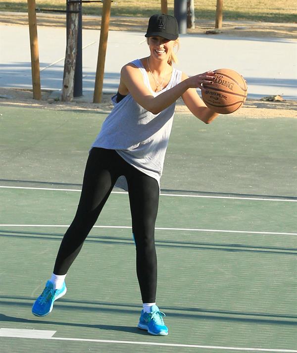 Delta Goodrem playing basketball with a friend in Los Angeles, California on November 3, 2013 