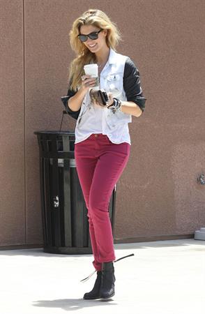 Delta Goodrem - Stopping to get a coffee on her way to work in Los Angeles, California - July 18, 2012