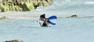 Demi Lovato and her bodyguard are spotted on the beach in Barbados April, 16 2013 
