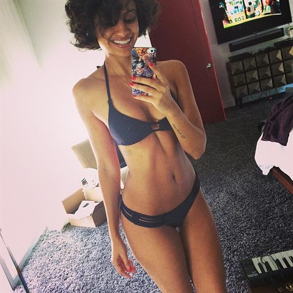 Nazanin Mandi in a bikini taking a selfie