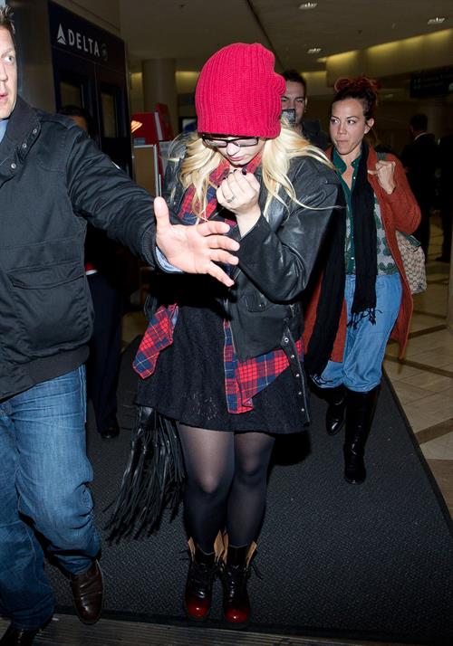Demi Lovato cute in a red touque & specs @ LA/28/12