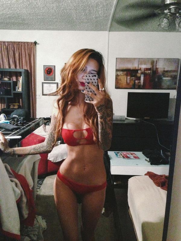 Jenah Yamamoto in a bikini taking a selfie