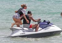 Doutzen Kroes bikini beach pictures in Miami August 16, 2012