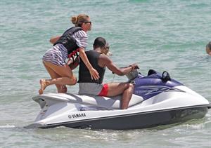 Doutzen Kroes bikini beach pictures in Miami August 16, 2012