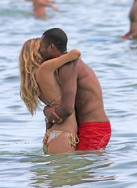 Doutzen Kroes bikini beach pictures in Miami August 16, 2012