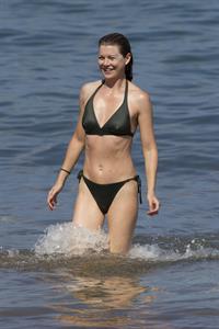 Ellen Pompeo - Wearing a sexy wet bikini on a beach in Maui (June 6, 2012)