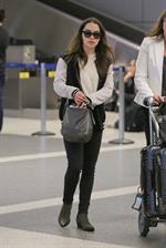 Emilia Clarke LAX airport in Los Angeles, October 15, 2013 