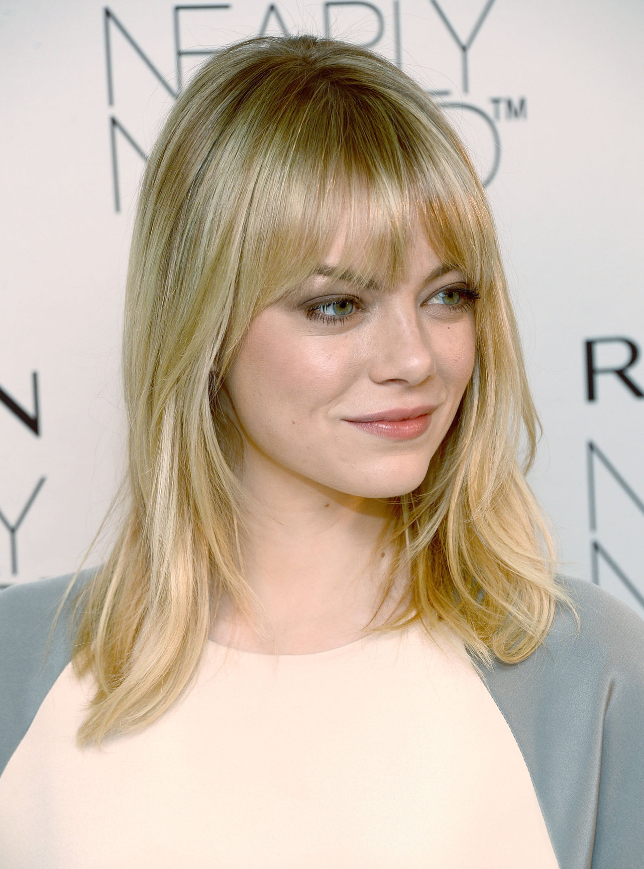 Emma Stone Revlon’s Nearly Naked makeup launch in NY 12/5/12 