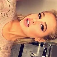 Meredith Mickelson taking a selfie