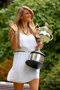 Victoria Azarenka poses with Memorial Cup after winning the 2013 Australian Open January 27, 2013 