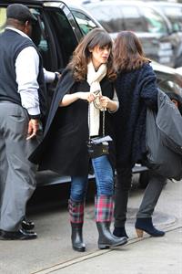 Zooey Deschanel seen out in SoHo holding a Chanel purse. November 16, 2012 