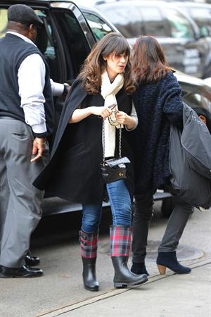 Zooey Deschanel seen out in SoHo holding a Chanel purse. November 16, 2012 