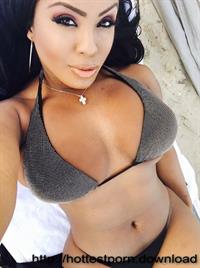 Anonymous in a bikini taking a selfie