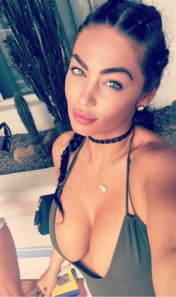 Anonymous in a bikini taking a selfie