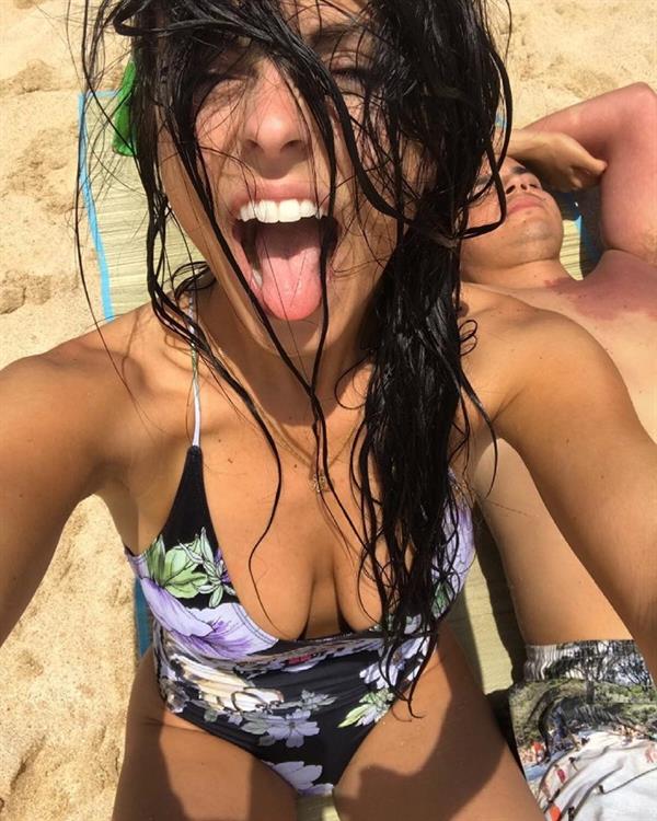 Anonymous in a bikini taking a selfie