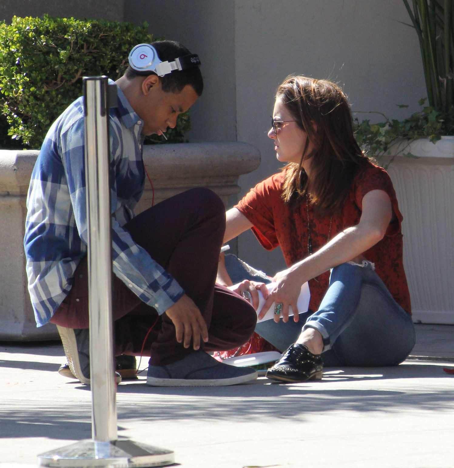 Jessica Stroup takes a break on the set of 90210 in Los Angeles on February 26, 2013