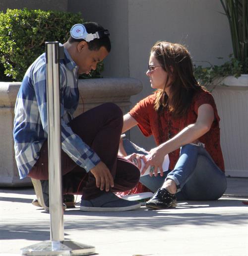 Jessica Stroup takes a break on the set of 90210 in Los Angeles on February 26, 2013