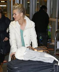 Joanna Krupa arriving at Chicago Airport on December 24, 2012