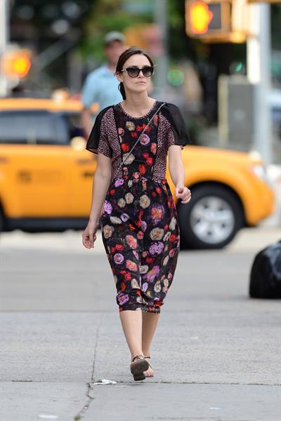 Keira Knightley wears a dark floral dress while strolling in New York City on August 7, 2012
