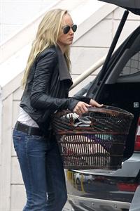 Kimberly Stewart Donating a trunk full of designer clothes at Wasteland in Los Angeles (November 15, 2012) 