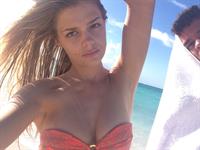 Danielle Knudson in a bikini taking a selfie
