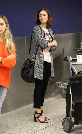 Lily Collins - LAX Airport 8/27/13