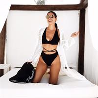 Nicole Isaacs in a bikini