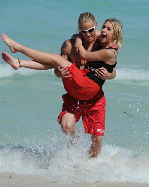 Lucy Hale and Ashley Benson photoshoot at the Bondo Bikini Shack on Miami Beach on March 24, 2012