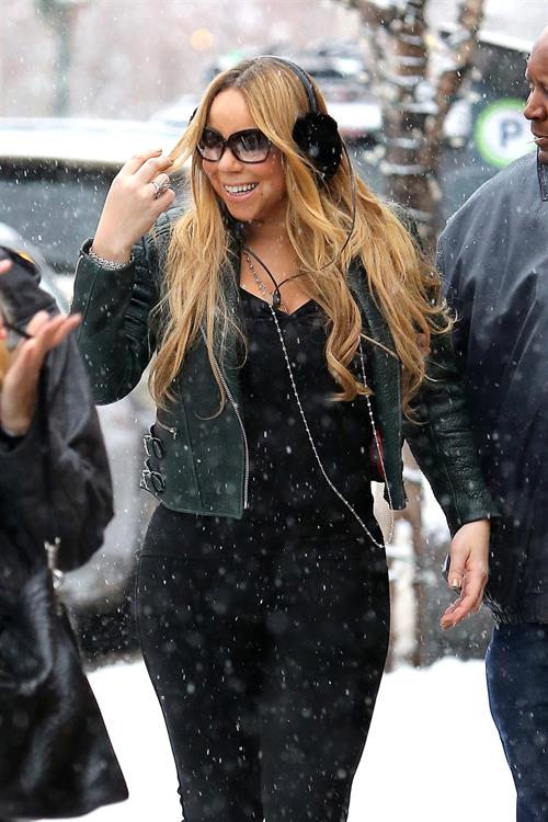 Mariah Carey made another stop at the Louis Vuitton store to shop with a family member. December 24, 2012 