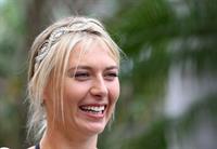 Maria Sharapova poses for a Photograph during a WTA all access Hour at the Ritz Carlton Hotel in Key Biscayne