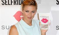 Maria Sharapova poses at a Photocall to launch her new range of Candy 'Sugarpova' at Selfridges June 20, 2013 