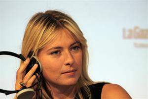 Maria Sharapova attends a press conference to present Saturday's exhibition match Milan November 30, 2012 
