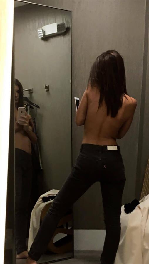 Emily Ratajkowski taking a selfie