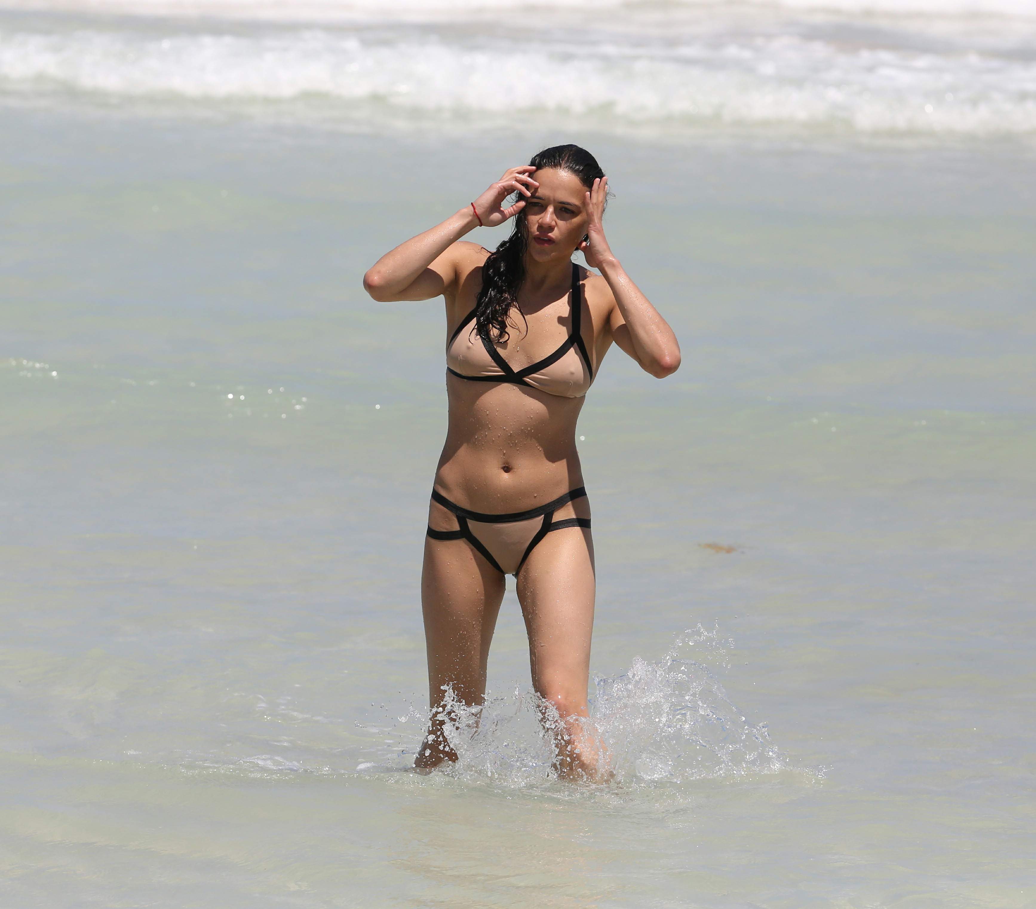 Michelle Rodriguez enjoying the sun at Miami Beach April 26-2013 